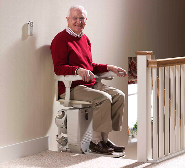 Man riding up the stairs in a Stair Chair in South Jersey